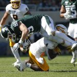Michigan State tight end Matt Dotson (89) is upended by Arizona State's Evan Fields  after a catch during the first quarter of an NCAA college football game Saturday, Sept. 14, 2019, in East Lansing, Mich. (AP Photo/Al Goldis)
