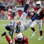 Seattle Seahawks tight end Will Dissly (88) is tackled by Arizona Cardinals strong safety Budda Baker (32) during the first half of an NFL football game, Sunday, Sept. 29, 2019, in Glendale, Ariz. (AP Photo/Rick Scuteri)