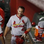 St. Louis Cardinals' Paul Goldschmidt smiles in the dugout after hitting a two-run home run against the Arizona Diamondbacks during the third inning of a baseball game Monday, Sept. 23, 2019, in Phoenix. (AP Photo/Ross D. Franklin)