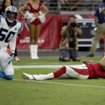 Arizona Cardinals quarterback Kyler Murray lies on the field after being sacked by Carolina Panthers linebacker Christian Miller (50) during the second half of an NFL football game, Sunday, Sept. 22, 2019, in Glendale, Ariz. (AP Photo/Rick Scuteri)