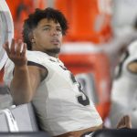 Colorado defensive end Mustafa Johnson watches from the bench after leaving the game with a leg injury during the first half of the team's NCAA college football game against Arizona State, Saturday, Sept. 21, 2019, in Tempe, Ariz. (AP Photo/Rick Scuteri)