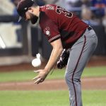 Arizona Diamondbacks' starting pitcher Robbie Ray tosses the rosin bag after allowing a two-run home run to New York Mets' Todd Frazier during the first inning of a baseball game Wednesday, Sept. 11, 2019, in New York. Ray allowed five earned runs in the first inning before Diamondbacks' manager Torey Lovullo replaced him. (AP Photo/Kathy Willens)