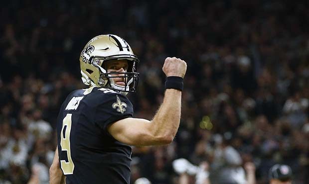 New Orleans Saints quarterback Drew Brees reacts after a touchdown carry by running back Alvin Kama...