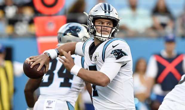 FILE - In this Aug. 29, 2019, file photo, Carolina Panthers quarterback Kyle Allen (7) passes again...