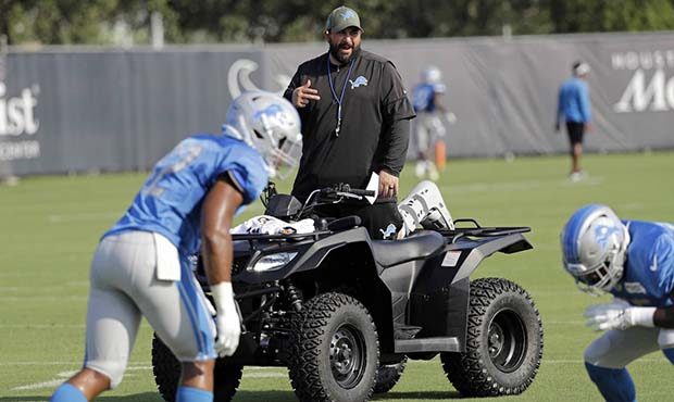 Detroit Lions coach Matt Patricia instructs players during a joint NFL training camp football pract...
