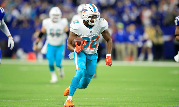 Kenyan Drake #32 of the Miami Dolphins runs with the ball  against the Indianapolis Colts at Lucas ...