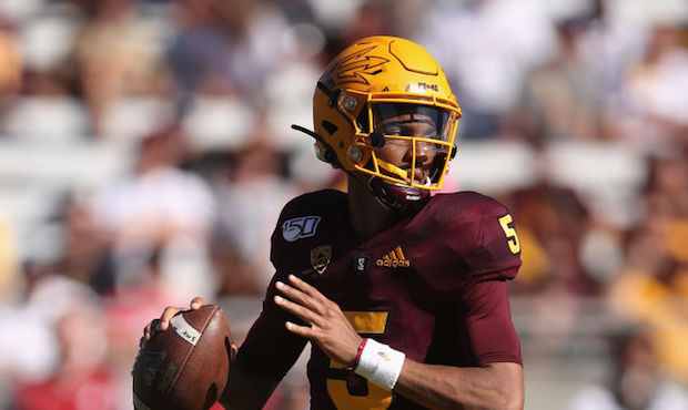 Quarterback Jayden Daniels #5 of the Arizona State Sun Devils drops back to pass during the second ...