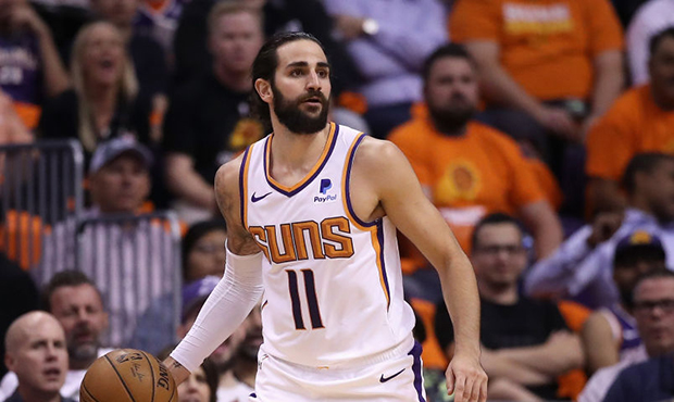 Ricky Rubio #11 of the Phoenix Suns handles the ball during the first half of the NBA game against ...