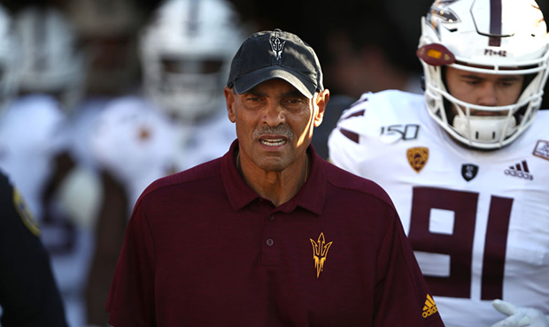 Head coach Herm Edwards enters the field prior to a game against the UCLA Bruins  on October 26, 20...