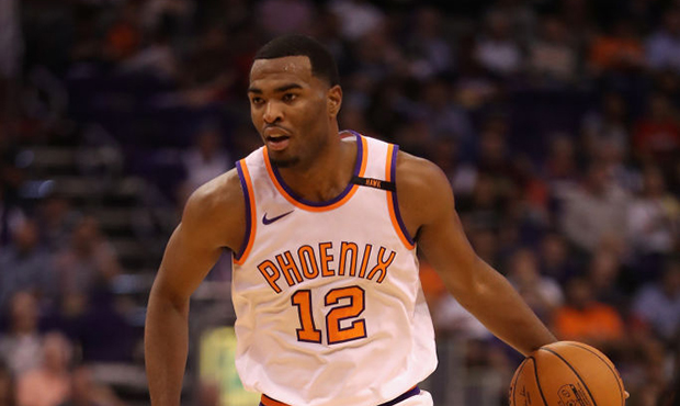 TJ Warren #12 of the Phoenix Suns handles the ball during the first half of the NBA game against th...