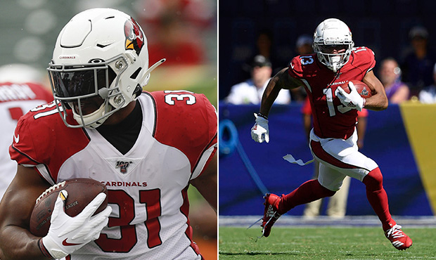 Arizona Cardinals running back David Johnson (left) (Photo by Michael Hickey/Getty Images). Wide re...