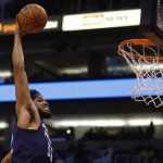 Minnesota Timberwolves center Karl-Anthony Towns dunks against the Phoenix Suns during the first half of a preseason NBA basketball game Tuesday, Oct. 8, 2019, in Phoenix. (AP Photo/Rick Scuteri)