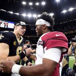 New Orleans Saints quarterback Drew Brees (9) greets Arizona Cardinals quarterback Kyler Murray after their NFL football game in New Orleans, Sunday, Oct. 27, 2019. The Saints won 31-9. (AP Photo/Bill Feig)