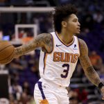 Phoenix Suns forward Kelly Oubre Jr. (3) moves the ball up the court during the second half of an NBA preseason basketball game against the Denver Nuggets, Monday, Oct. 14, 2019, in Phoenix. (AP Photo/Matt York)