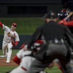 St. Louis Cardinals starting pitcher Miles Mikolas throws during the first inning of Game 1 of the baseball National League Championship Series against the Washington Nationals Friday, Oct. 11, 2019, in St. Louis. (AP Photo/Mark Humphrey)