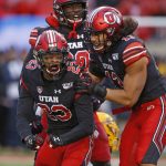 Utah's Julian Blackmon (23) and Francis Bernard (13) celebrate after a play against Arizona State during the first half of an NCAA college football game Saturday, Oct. 19, 2019, in Salt Lake City. (AP Photo/Rick Bowmer)