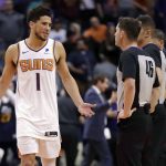 Phoenix Suns guard Devin Booker (1) looks at the officials after an NBA basketball game against the Utah Jazz, Monday, Oct. 28, 2019, in Phoenix. The Jazz won 96-95. (AP Photo/Matt York)
