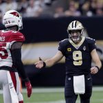 New Orleans Saints quarterback Drew Brees (9) reacts towards Arizona Cardinals linebacker Chandler Jones (55) between plays in the first half of an NFL football game in New Orleans, Sunday, Oct. 27, 2019. (AP Photo/Bill Feig)