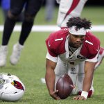Arizona Cardinals quarterback Kyler Murray (1) gets up off the turf after losing his helmet while being sacked by New Orleans Saints defensive end Cameron Jordan, not pictured, in the second half of an NFL football game in New Orleans, Sunday, Oct. 27, 2019. (AP Photo/Bill Feig)