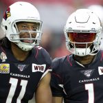 Arizona Cardinals wide receiver Larry Fitzgerald (11) and quarterback Kyler Murray (1) wear a "WVB" patch in memory of the Cardinals' late owner William V. Bidwill prior to an NFL football game against the Atlanta Falcons, Sunday, Oct. 13, 2019, in Glendale, Ariz. (AP Photo/Ross D. Franklin)