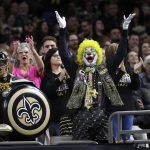 New Orleans Saints fans cheer in the first half of an NFL football game against the Arizona Cardinals in New Orleans, Sunday, Oct. 27, 2019. (AP Photo/Bill Feig)