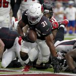 Arizona Cardinals running back David Johnson (31) scores a touchdown against the Atlanta Falcons during the first half of an NFL football game, Sunday, Oct. 13, 2019, in Glendale, Ariz. (AP Photo/Ross D. Franklin)