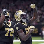 New Orleans Saints running back Latavius Murray celebrates his touchdown with offensive tackle Terron Armstead (72) in the first half of an NFL football game against the Arizona Cardinals in New Orleans, Sunday, Oct. 27, 2019. (AP Photo/Bill Feig)