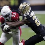 New Orleans Saints defensive back Chauncey Gardner-Johnson (22) tackles Arizona Cardinals running back Chase Edmonds (29) in the first half of an NFL football game in New Orleans, Sunday, Oct. 27, 2019. (AP Photo/Bill Feig)