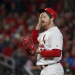 St. Louis Cardinals' Miles Mikolas reacts after walking the bases loaded during the fifth inning of Game 1 of the baseball National League Championship Series against the Washington Nationals Friday, Oct. 11, 2019, in St. Louis. (AP Photo/Jeff Roberson)