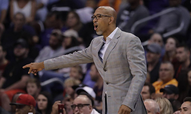 Phoenix Suns head coach Monty Williams instructs his team during the first half of an NBA preseason...