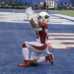 Arizona Cardinals' Chase Edmonds celebrates after scoring a touchdown during the first half of an NFL football game against the New York Giants, Sunday, Oct. 20, 2019, in East Rutherford, N.J. (AP Photo/Bill Kostroun)