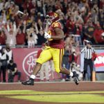 Southern California running back Markese Stepp (30) scores a rushing touchdown against Arizona during the first half of an NCAA college football game Saturday, Oct. 19, 2019, in Los Angeles. (AP Photo/Marcio Jose Sanchez)