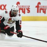 Ottawa Senators left wing Anthony Duclair tries to control the puck as he falls to the ice during the second period of an NHL hockey game against the Arizona Coyotes, Saturday, Oct. 19, 2019, in Glendale, Ariz. (AP Photo/Ross D. Franklin)