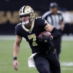New Orleans Saints quarterback Taysom Hill (7) carries in the first half of an NFL football game against the Arizona Cardinals in New Orleans, Sunday, Oct. 27, 2019. (AP Photo/Bill Feig)