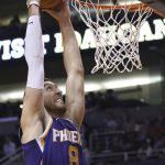 Phoenix Suns forward Frank Kaminsky dunks against the LA Clippers during the second half of a basketball game Saturday, Oct. 26, 2019, in Phoenix. The Suns defeated the Clippers 130-122. (AP Photo/Ross D. Franklin)
