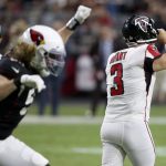 Atlanta Falcons kicker Matt Bryant (3) reacts to missing the point after as Arizona Cardinals linebacker Brooks Reed celebrates during the second half of an NFL football game, Sunday, Oct. 13, 2019, in Glendale, Ariz. The Cardinals won 34-33. (AP Photo/Ross D. Franklin)