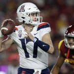 Arizona quarterback Grant Gunnell (17) looks for a receiver during the second half of the team's NCAA college football game against Southern California on Saturday, Oct. 19, 2019, in Los Angeles. (AP Photo/Marcio Jose Sanchez)
