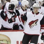Arizona Coyotes' Michael Grabner (40) celebrates with teammates after scoring a goal during the second period of the team's NHL hockey game against the New Jersey Devils on Friday, Oct. 25, 2019, in Newark, N.J. (AP Photo/Frank Franklin II)