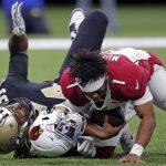 Arizona Cardinals quarterback Kyler Murray (1) loses his helmet as he is sacked by New Orleans Saints defensive end Cameron Jordan (94) in the second half of an NFL football game in New Orleans, Sunday, Oct. 27, 2019. (AP Photo/Bill Feig)