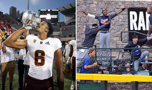 Left: Geordon Porter of the Arizona State Sun Devils mimics drinking from the Territorial Cup follo...