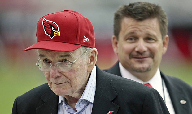 FILE - In this Sept. 9, 2012, file photo, Arizona Cardinals owner Bill Bidwill, front, and his son,...