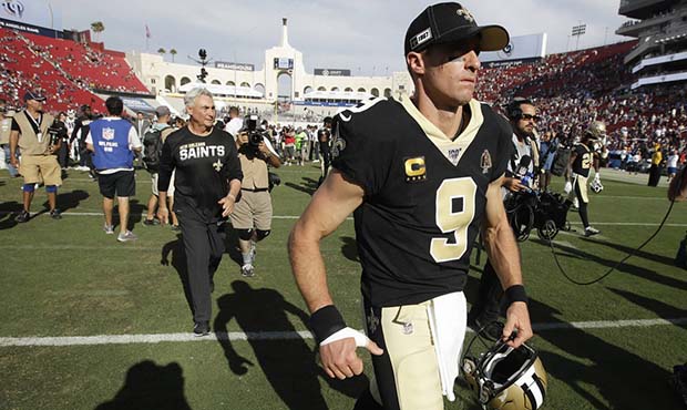 New Orleans Saints quarterback Drew Brees leaves the field after their loss against the Los Angeles...