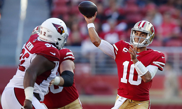 San Francisco 49ers quarterback Jimmy Garoppolo (10) passes against the Arizona Cardinals during th...