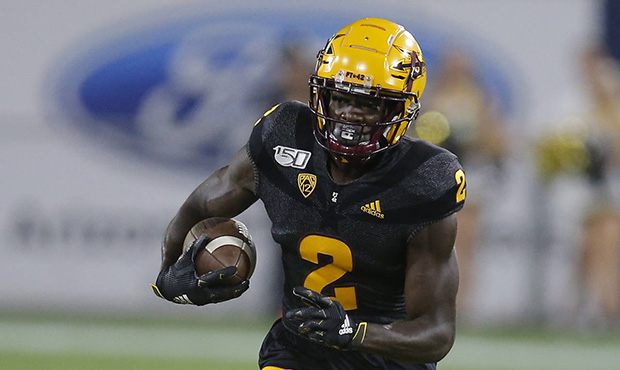 Arizona State wide receiver Brandon Aiyuk runs for a first down against Colorado during the first h...