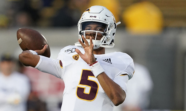 Jayden Daniels #5 of the Arizona State Sun Devils warms up prior to the start of an NCAA football g...