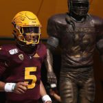 Quarterback Jayden Daniels #5 of the Arizona State Sun Devils runs past the Pat Tillman statue before the NCAAF game against the Washington State Cougars at Sun Devil Stadium on October 12, 2019 in Tempe, Arizona. (Photo by Christian Petersen/Getty Images)