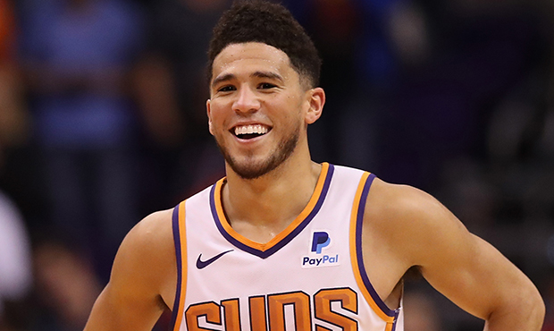 Devin Booker #1 of the Phoenix Suns reacts during the final moments of the second half of the NBA g...