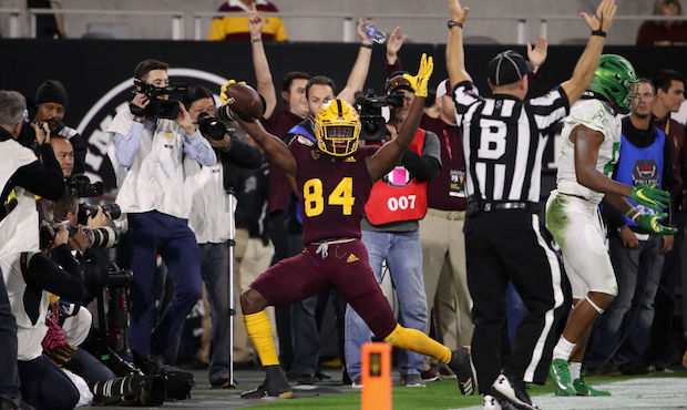 Wide receiver Frank Darby #84 of the Arizona State Sun Devils celebrates after scoring on a 26 yard...