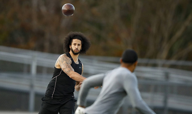 Free agent quarterback Colin Kaepernick participates in a workout for NFL football scouts and media...