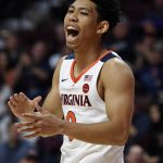 Virginia's Kihei Clark reacts during the first half of an NCAA college basketball game against Arizona State, Sunday, Nov. 24, 2019, in Uncasville, Conn. (AP Photo/Jessica Hill)